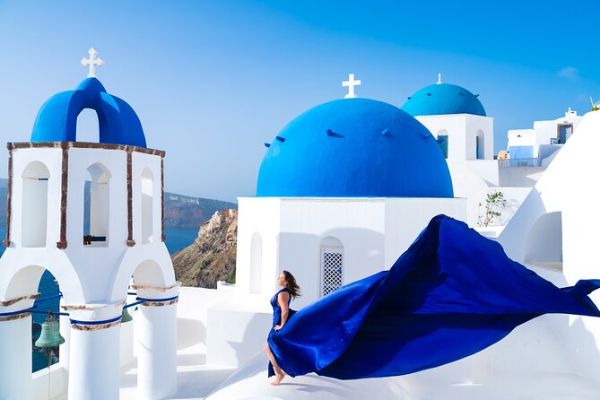 1-Hour Flying Dress Photoshoot, Instagram spots - Firostefani brings the classic blue-domed setting
