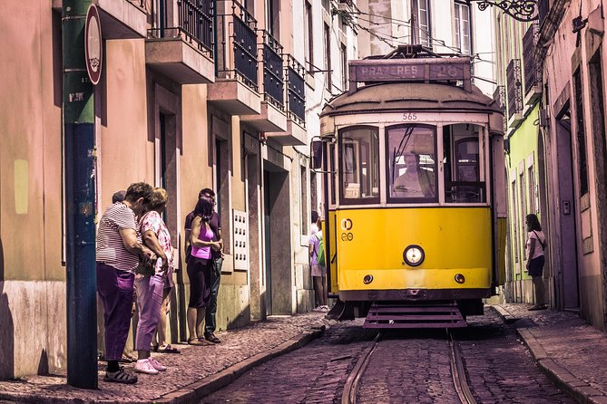 Alfama Photo Walk – Lisbon Photography Experience Led by a Local - Trams and church architecture in Graça and São Vicente