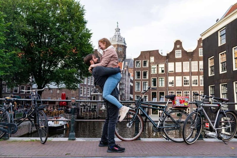 Amsterdam Canals Photoshoot: Private Solo, Family or Couples - Damrak’s canal houses as your first backdrop