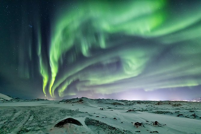 Aurora/Northern light hunt and photos (photography help provided) - Hot drinks, small groups, and the pace of the night
