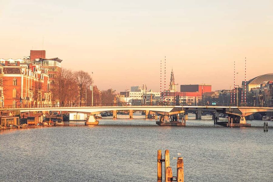 Capture Iconic Amsterdam: Photo Walk with a Pro Photographer - Starting at Dam Square with the right camera settings