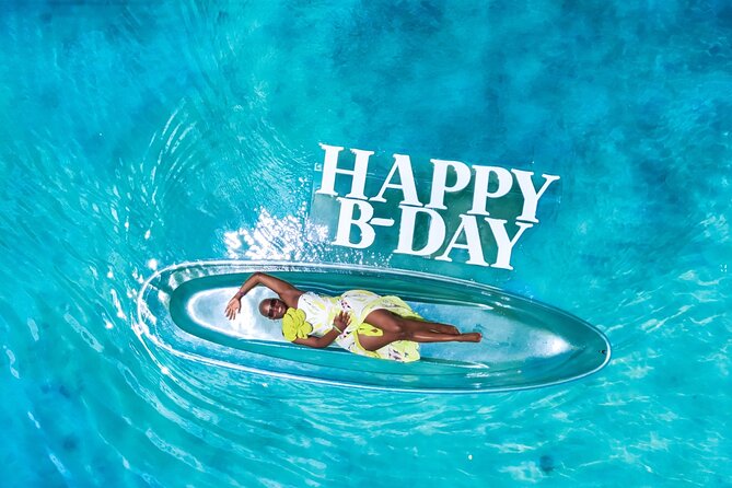 Clear Kayak Drone Photo Shoot and Video in Montego Bay - Flowers, Jamaica letters, and celebration touches
