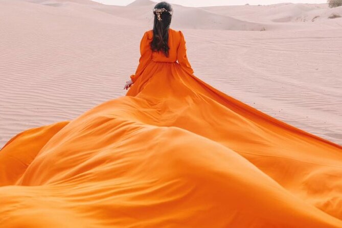 Dubai Desert Flying Dress Photoshoot - Who will enjoy this experience most?