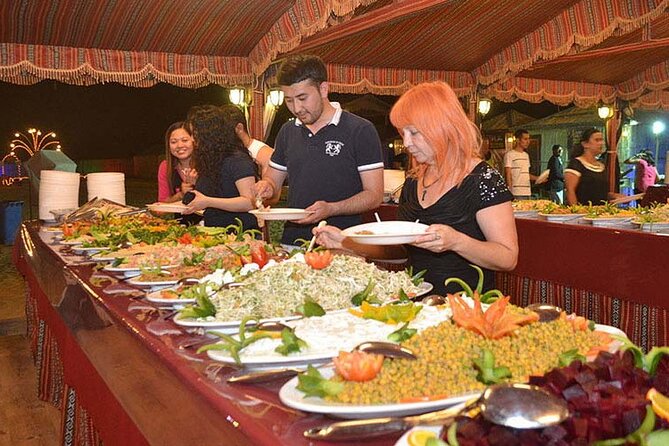 Dubai desert safari & buggy tour & flying dress for free - Guide support and group size