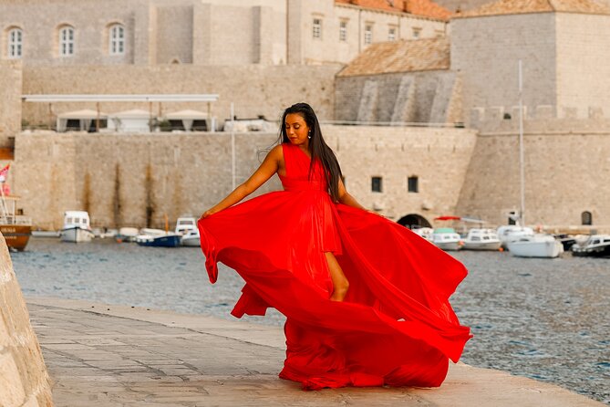 Dubrovnik: Private Flying Dress Photoshoot Experience - Rector’s Palace adds polished stone and civic grandeur