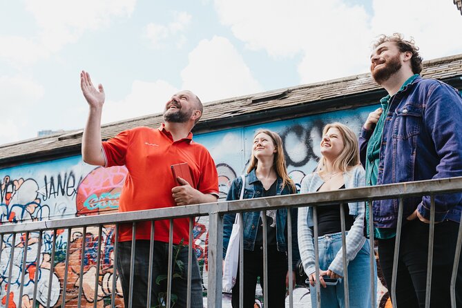 East End London Instagrammable Street Art and Graffiti Tour - Community, migration, and the meaning behind a simple figure
