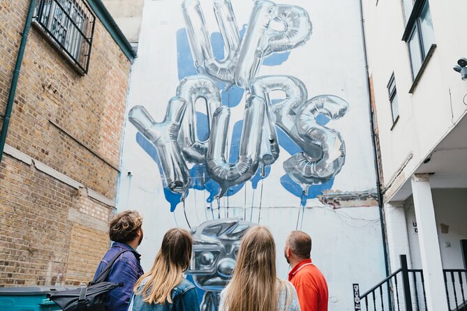 East End London Instagrammable Street Art and Graffiti Tour - A Banksy wall fragment and Shakespeare on a bench