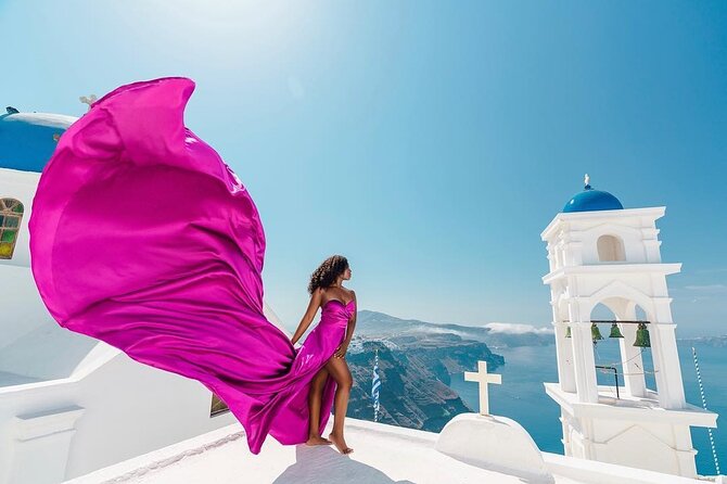 Exclusive Santorini Flying Dress Photoshoot with Pickup - From hotel pickup to the Imerovigli studio