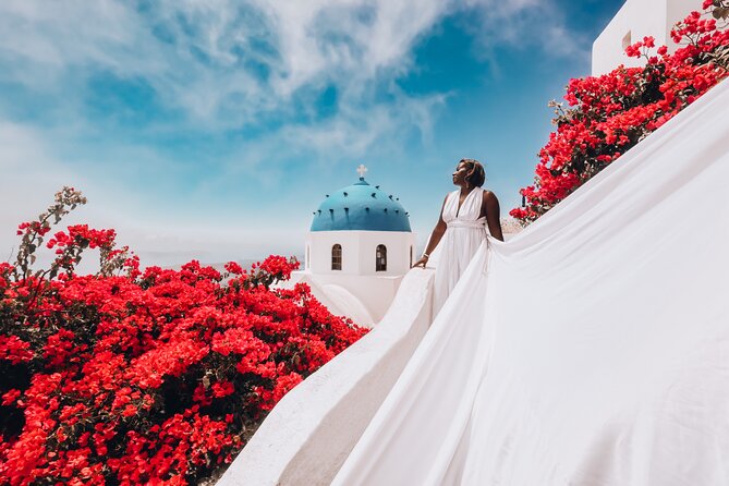 Exclusive Santorini Flying Dress Photoshoot with Pickup - Blue domes, rooftops, and Caldera views