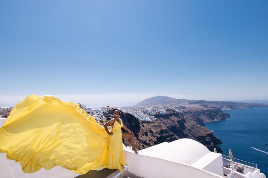 Flying dress Photoshoot in Santorini with Hotel Pickup - Private pickup from seven Santorini areas
