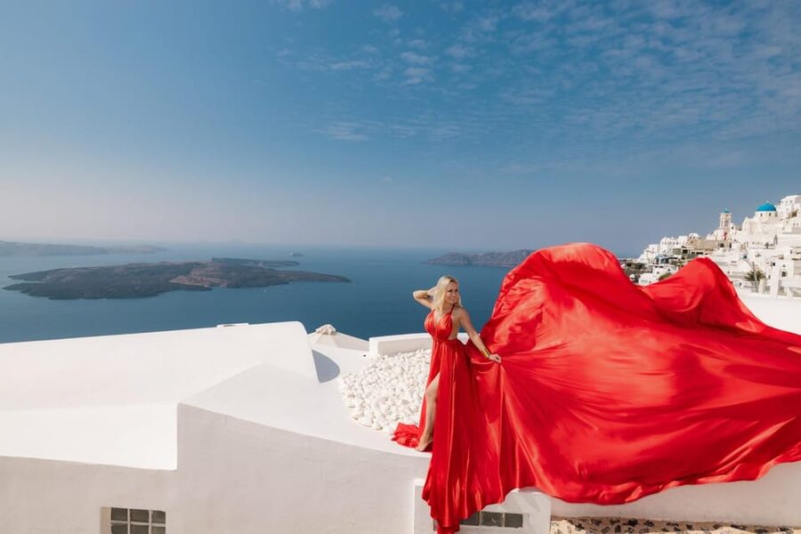 Flying dress Photoshoot in Santorini with Hotel Pickup - Imerovigli’s white walls and caldera views