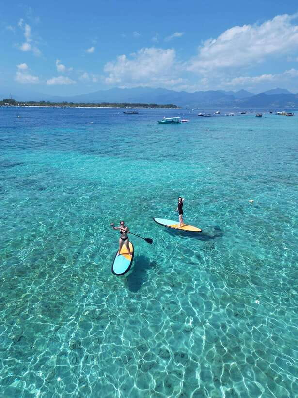 Gili sunrise stand-up paddle boarding (drone photoshoot) - The view toward all three Gilis