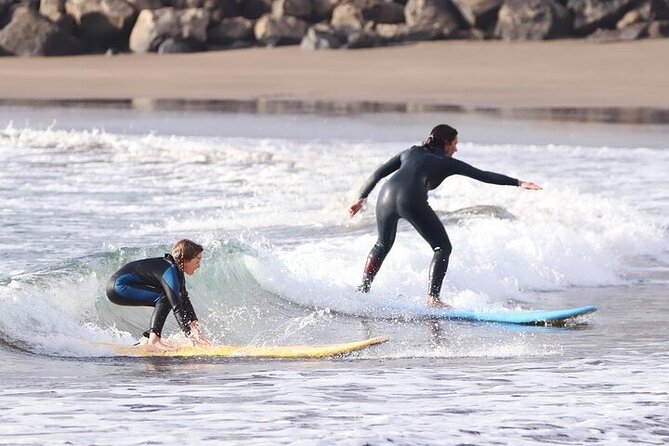 Group Surf Class in Playa de Las Américas with Photographs - Stretching, snacks, and the return to the school