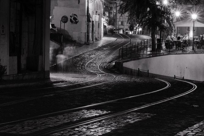 Lisbon by Night: Golden and Blue Hour Photography Walk - Walking down into Alfama