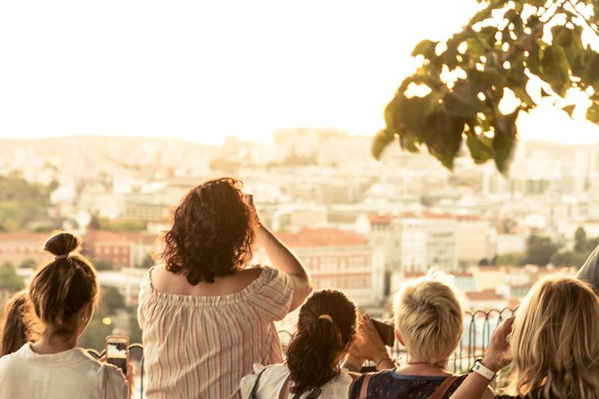 Lisbon by Night: Golden and Blue Hour Photography Walk - Photographing trams, alleys, and lit buildings