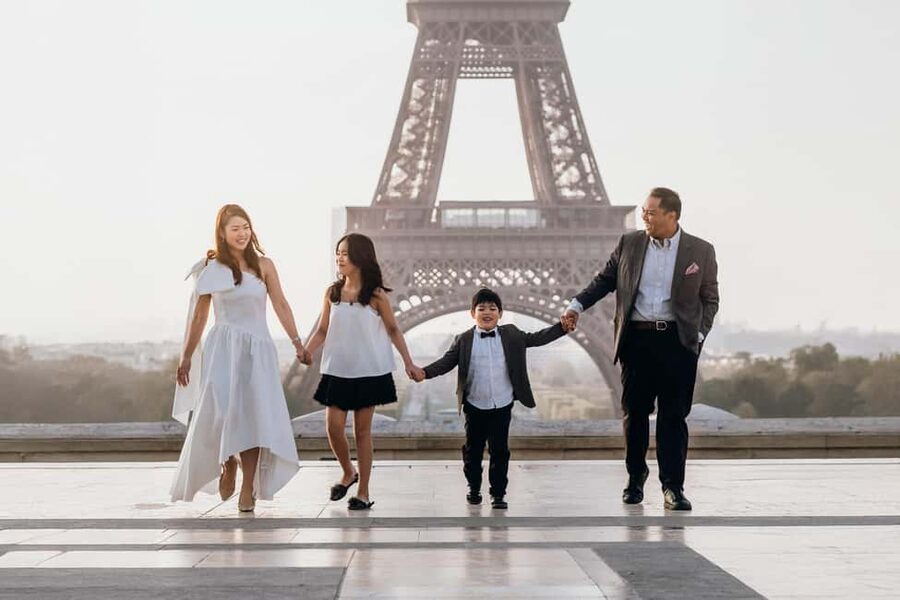 Paris: Private Eiffel Tower Photoshoot for Couples & Family - A photoshoot built around movement, not stiff poses