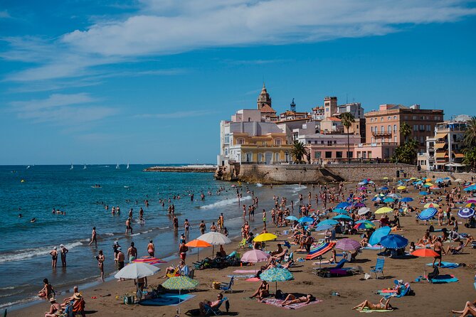 Photo Walking Tour Sitges Experience Beaches and Town - Waterfront photographs at La Sirena de Sitges