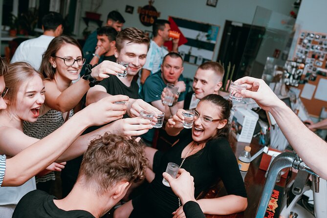 Pub Crawl + Unlimited Drinks + VIP entry + Drinking Games & Photographer - The First Stop: Open Bar and Drinking Games