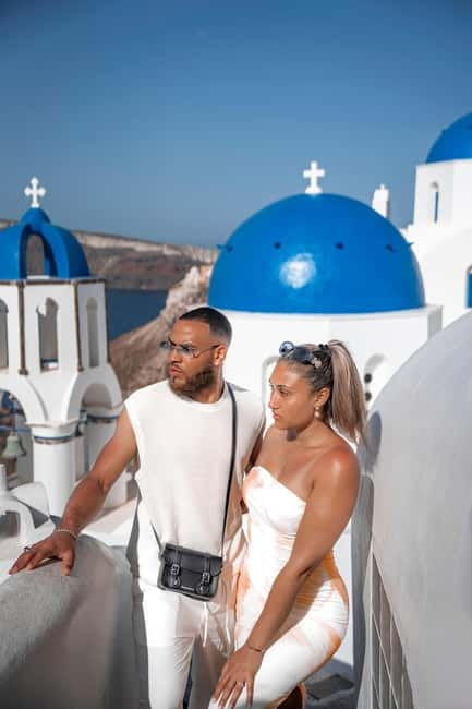 Santorini: Oia Private Couple Photoshoot with 35 Photos - Whitewashed lanes and blue-domed churches