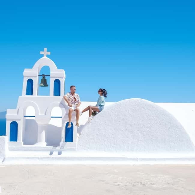 Santorini: Private Oia Village Photoshoot - Walking through Oia’s lanes and rooftops